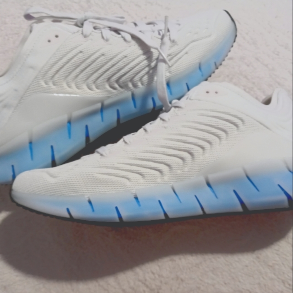 Men's Reebok running shoes NWOT.
